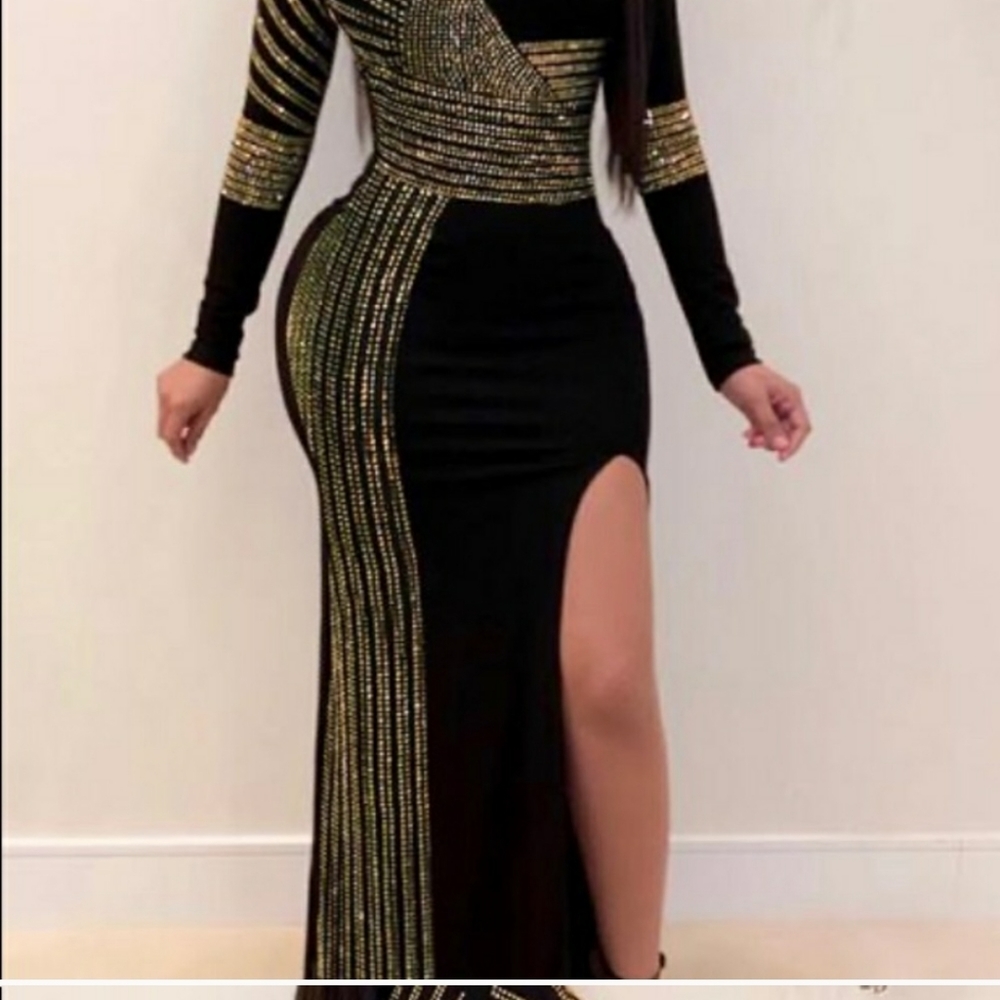 Stunning Black dress size Medium with all the details!